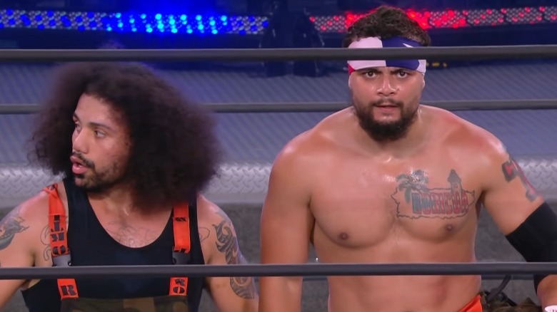 Santana and Ortiz post-match