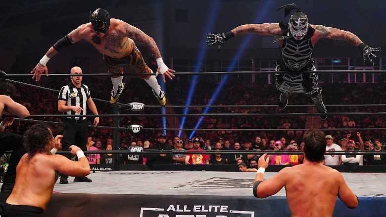 Lucha Bros double dive