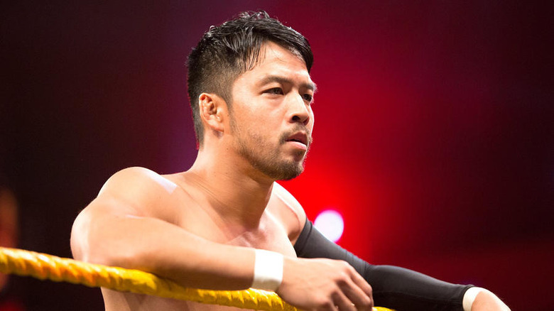 Hideo Itami leans on ropes