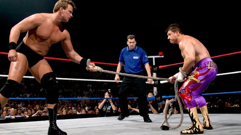 JBL and Eddie Guerrero holding a bullrope