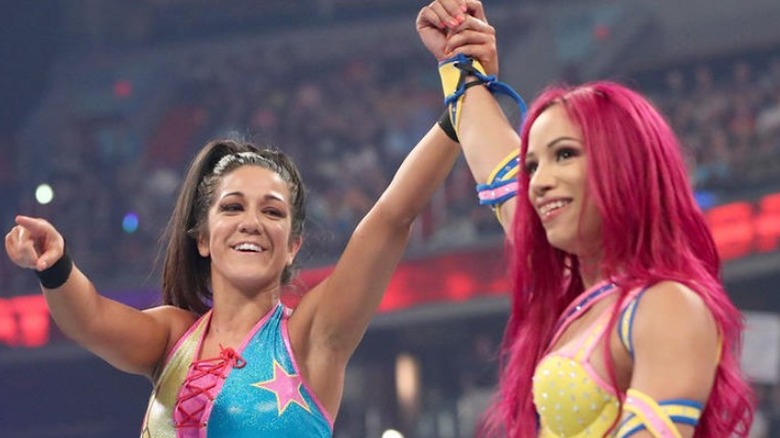 Bayley and Sasha Banks celebrate