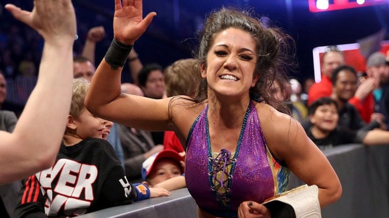 Bayley high-fives a fan