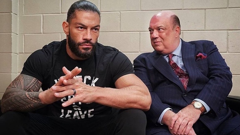 Roman on the couch with Heyman