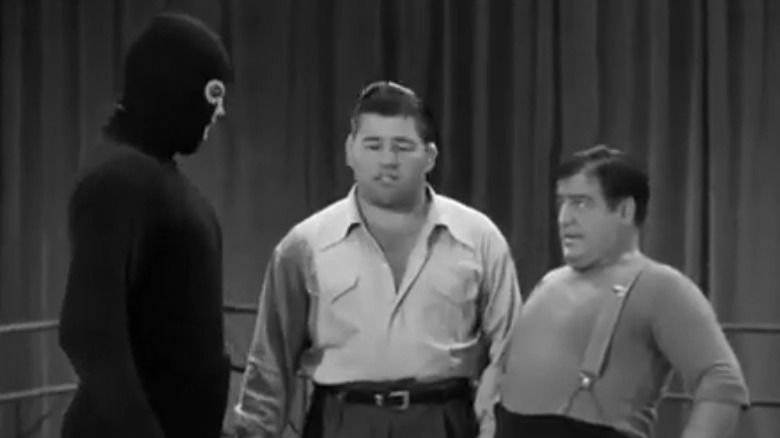 Lou Costello and Masked Marvel face off