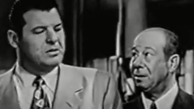 Jack Carson and Bert Lahr look at each other