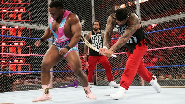 The Usos blast Big E with a kendo stick.