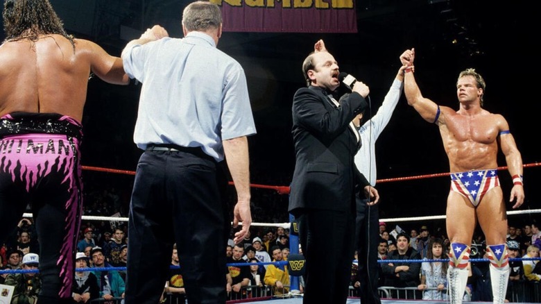 Referees raise the hands of Bret Hart and Lex Luger in the middle of the ring during the 1994 Royal Rumble match as both were declared victors.