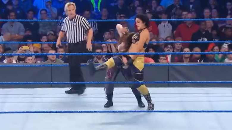 Bayley about to deliver the Rose Plant