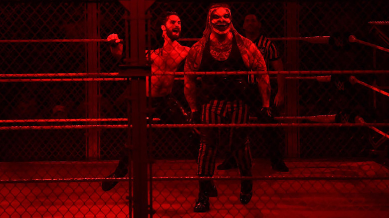 Bray Wyatt and Seth Rollins inside Hell in a Cell