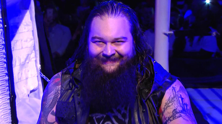 Bray Wyatt sits up from the Undertaker's casket