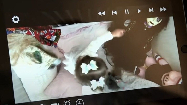 The Miz's daughter Monroe is seen on a baby monitor playing with the puppets from the "Firefly Funhouse."