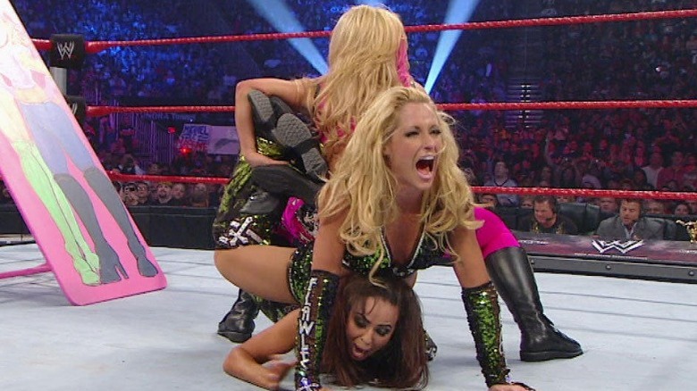 Natalya applying the double Sharpshooter for the first time ever