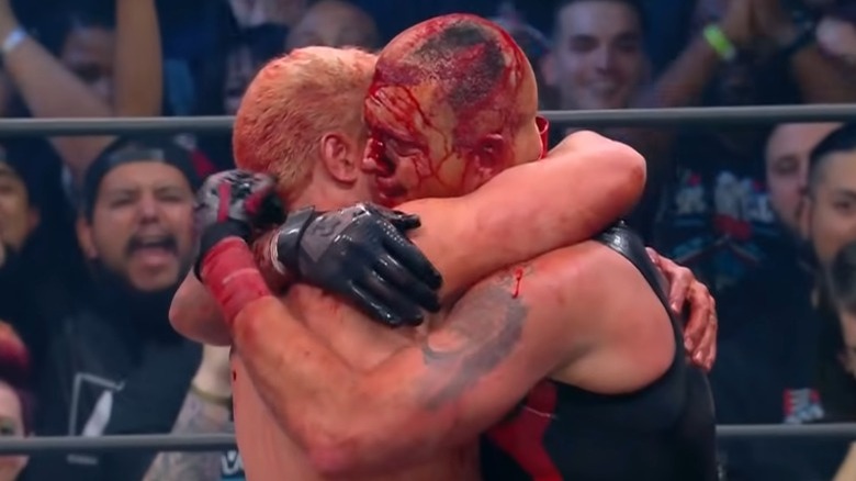 Cody Rhodes hugging Dustin Rhodes