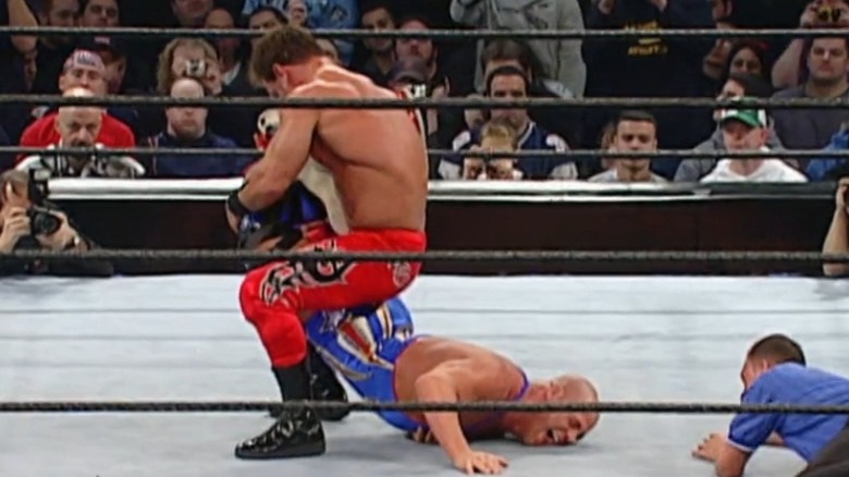 Chris Benoit puts Kurt Angle in the Sharpshooter