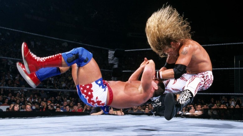 Edge hits Kurt Angle with the Edge-O-Matic