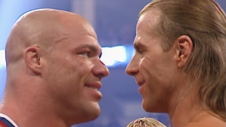 Kurt Angle facing Shawn Michaels