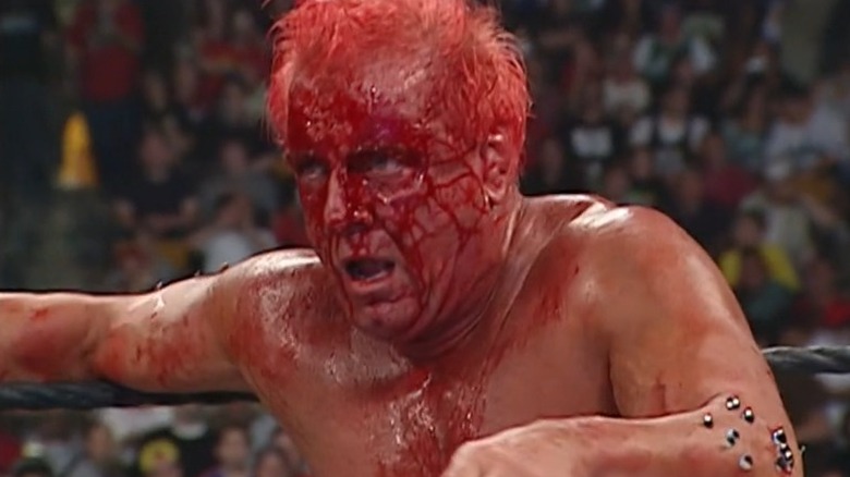 Ric Flair bloody with thumbtacks SummerSlam 2006