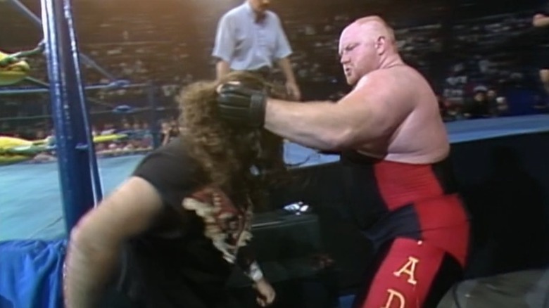 Vader punching Cactus Jack