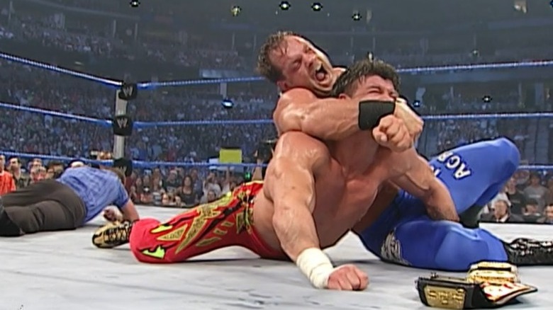 Chris Benoit with Eddie Guerrero in a crossface