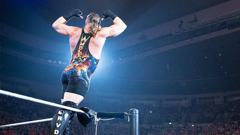 Rob Van Dam stands on second rope