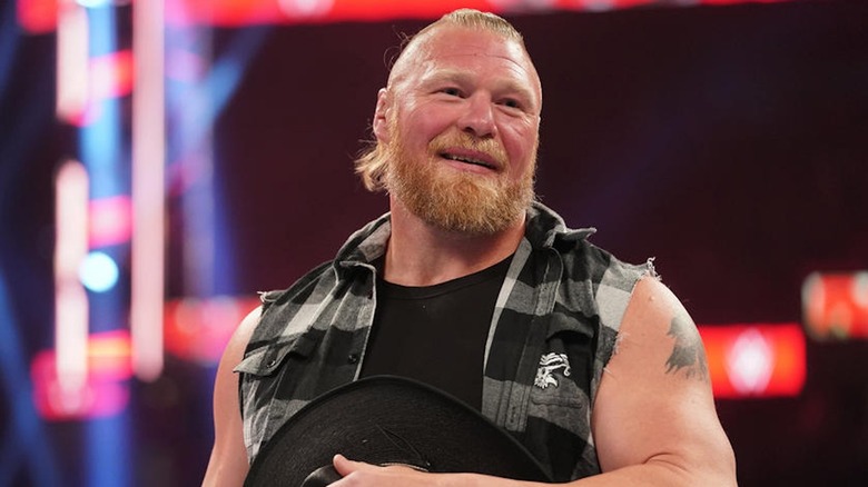 Brock Lesnar smirks before a promo