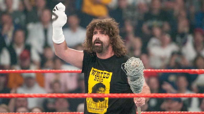 Mick Foley dons Mr. Socko and Barbie
