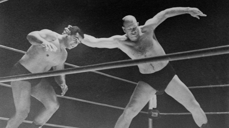 Fritz Von Erich prepares to throw Buddy Marino to the mat in their match. Von Erich won the match in 8 minutes, 32 seconds.