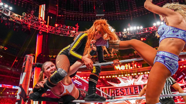 Ronda Rousey Becky Lynch and Charlotte Flair Fight 
