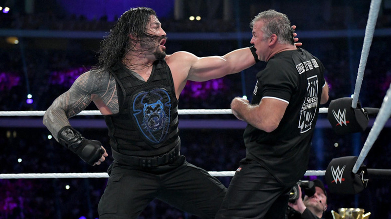 Roman Reigns punches Shane McMahon