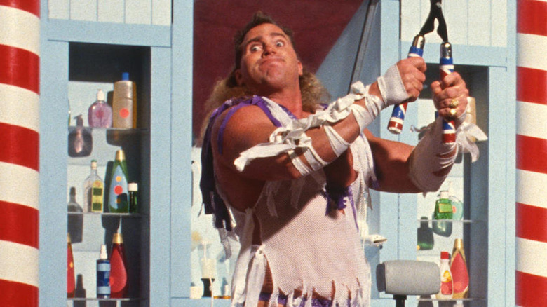 Brutus Beefcake carrying his huge clippers