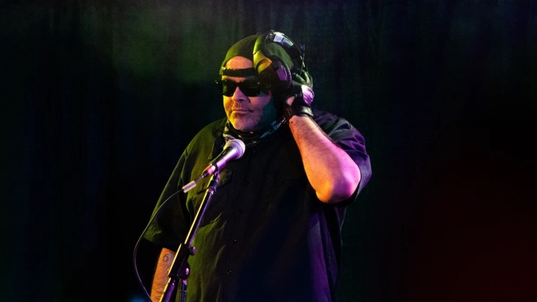 AAA booker Konnan, at his DJ job, where he should stay