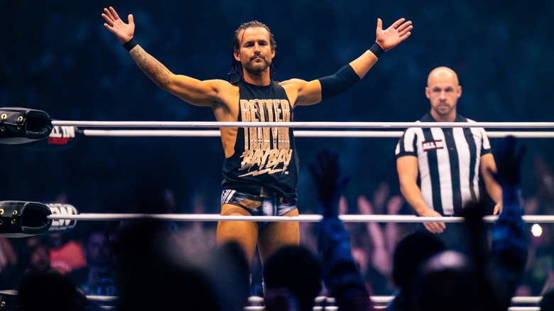 Adam Cole poses