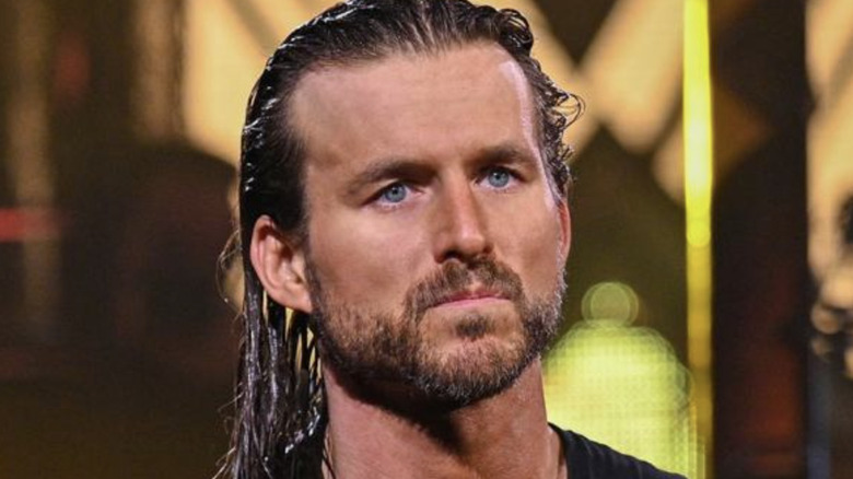 Adam Cole walking to the ring