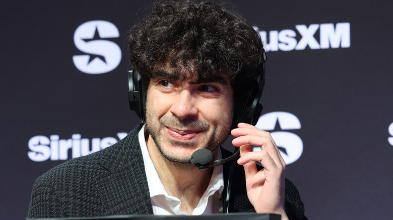 Tony Khan on a headset