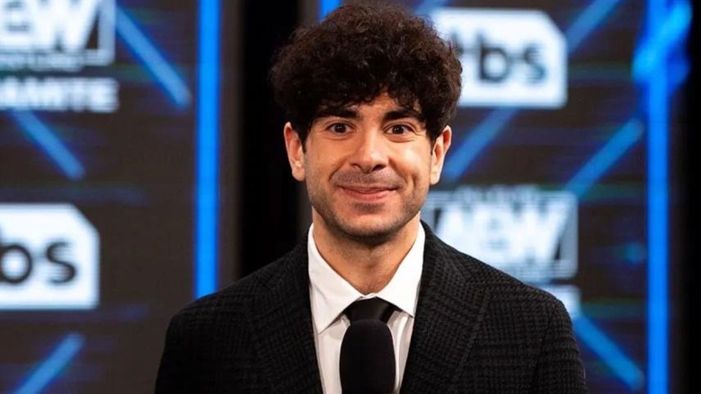 AEW CEO Tony Khan smiling