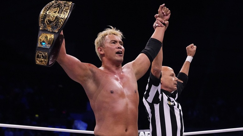 Kazuchika Okada holds up Continental title belt