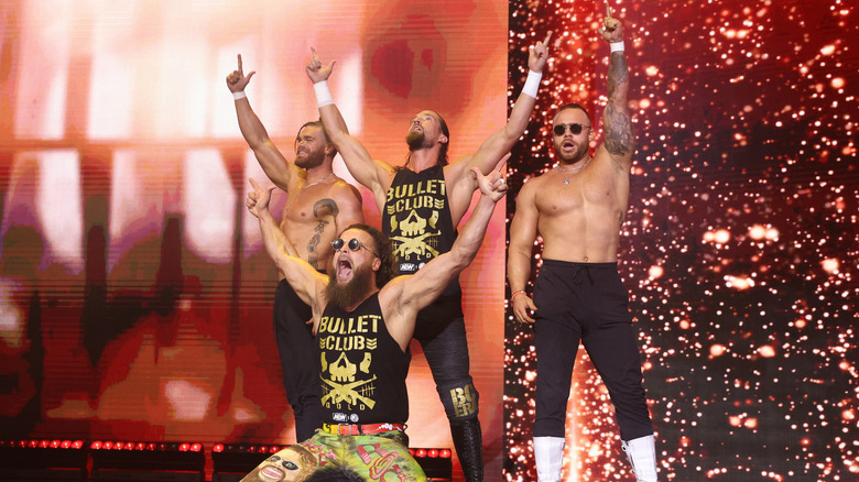 Bullet Club Gold poses