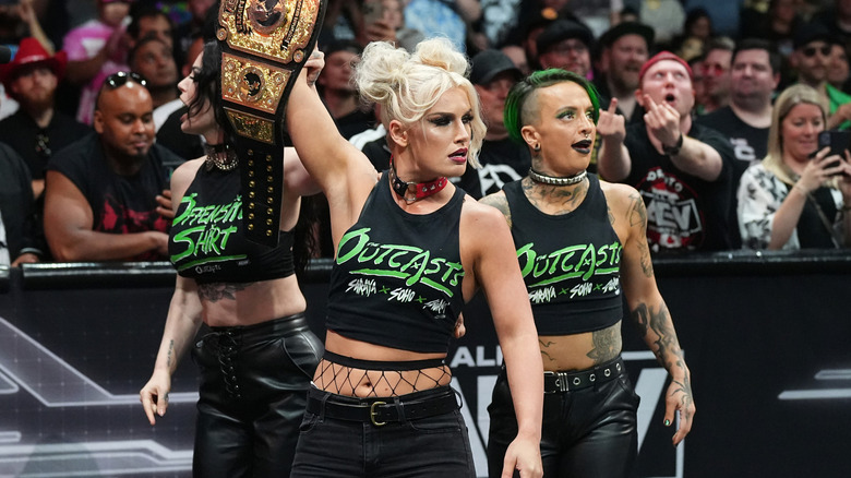 The Outcasts, with Toni Storm holding her title