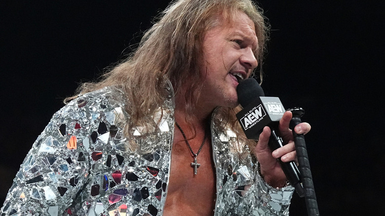 Chris Jericho with a microphone