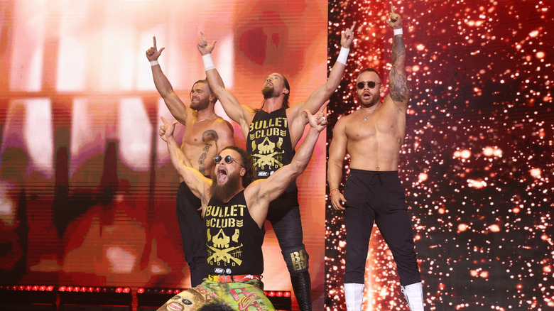 Bullet Club Gold make an entrance