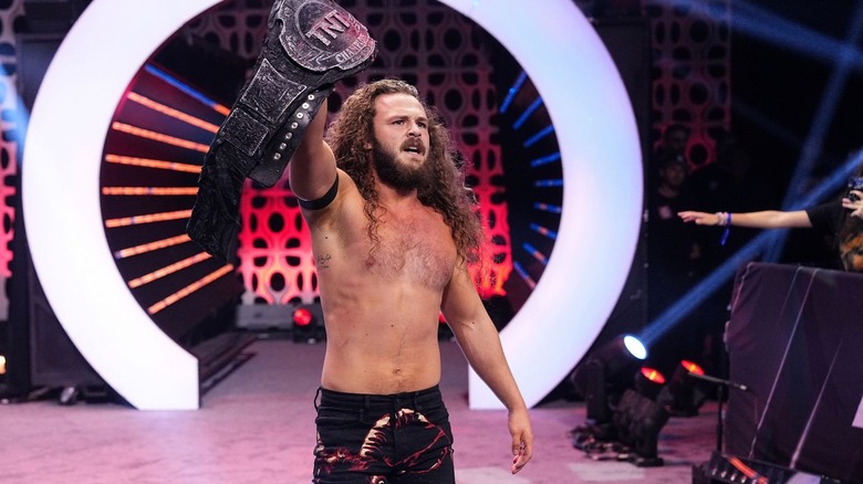 Jack Perry raises his TNT Championship on "AEW Dynamite."