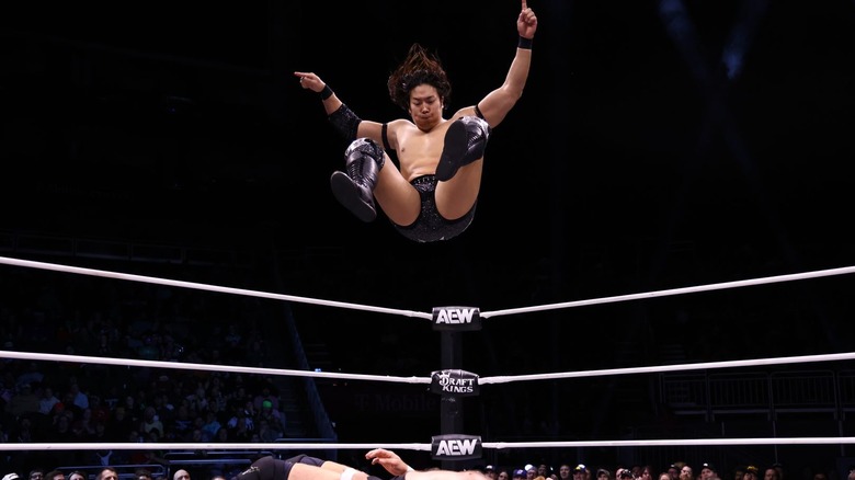 Takeshita jumping from the top rope