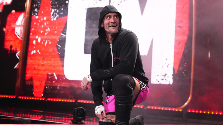 CM Punk kneeling