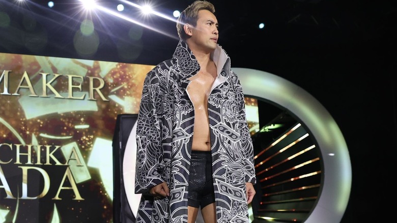 Kazuchika Okada watches on as he makes his entrance.