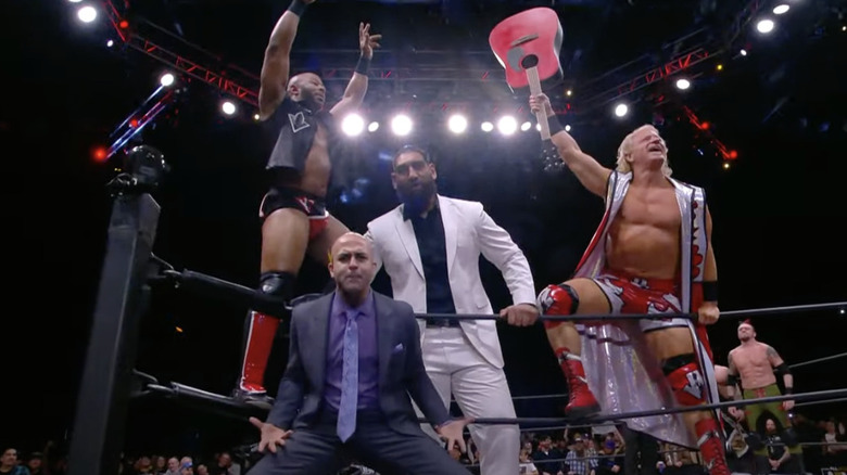 Lethal, Singh, Jarrett, and Dutt in the ring