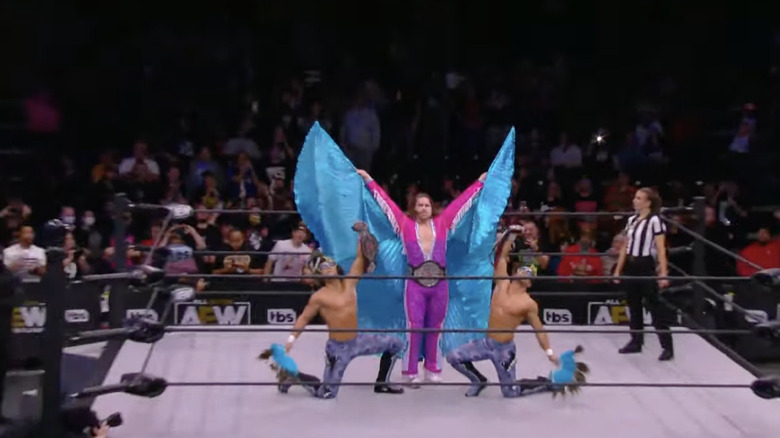 Castle and The Boys posing in the ring