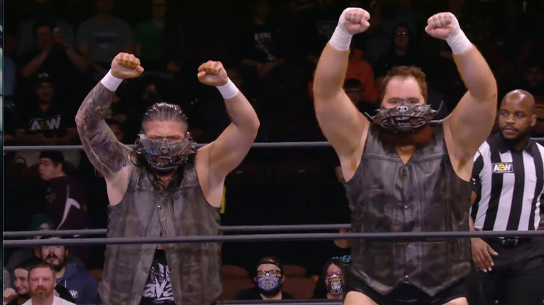 Bronson and Boulder posing in the ring