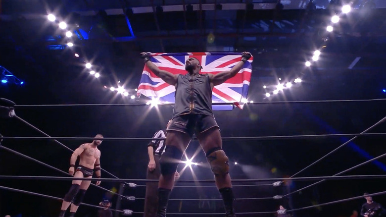 Ogogo holding up the Union Jack