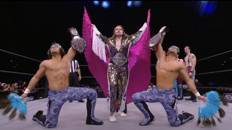 Castle and The Boys posing in the ring