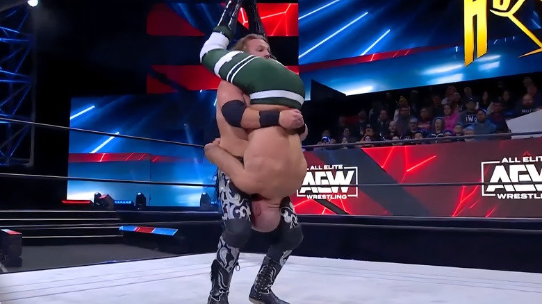 Adam Pag preparing to piledrive Claudio Castagnoli